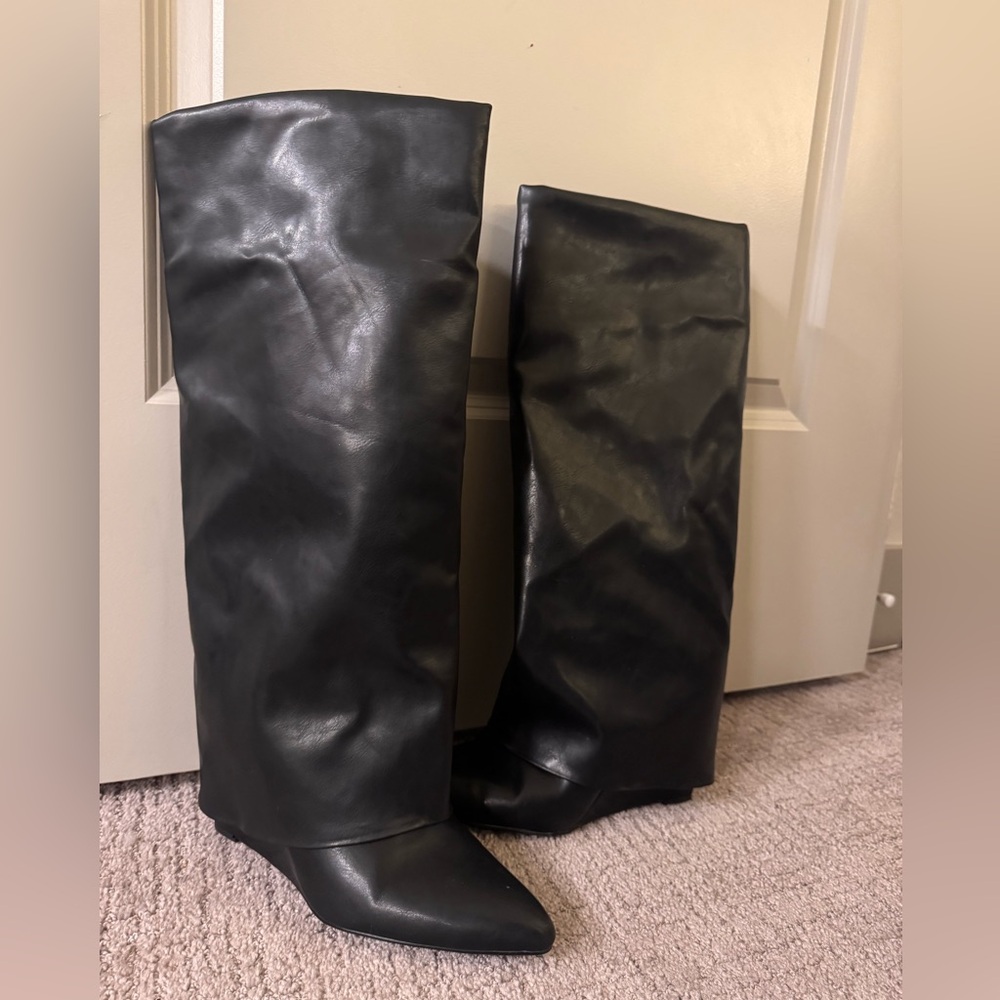 Pointed toe knee high black Boots. Dolce Vita